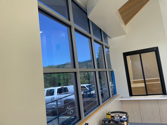Tinted office windows with mountain views and natural light