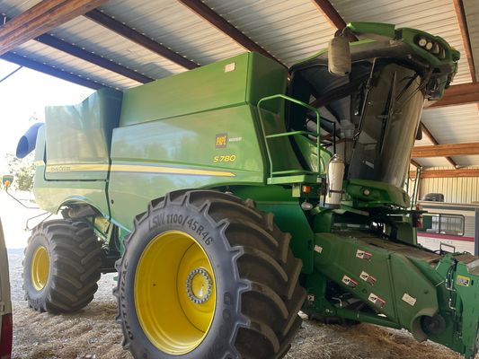 John Deere S780 combine with tinted cab windows